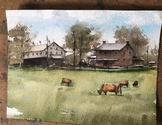 Watercolor painting of Custom Landscape - Baumgardner Homestead, New Carlisle, Ohio. Pastoral scene with cows grazing in a field and buildings in the background.