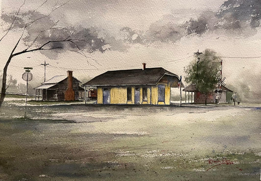 Historic South Charleston Depot watercolor print  with quiet, natural clarity. Soft washes of color highlight the depot’s simple architecture, the surrounding open space, and the calm atmosphere of small‑town Ohio. 
